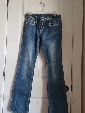 Grace Blue Flared Jeans with Whiskering
